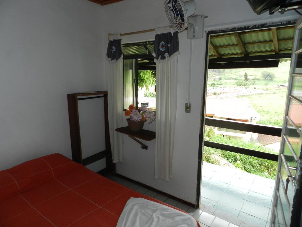 Pousada Hospedaria Santa Clara Santa Rita de Jacutinga Esterno foto
